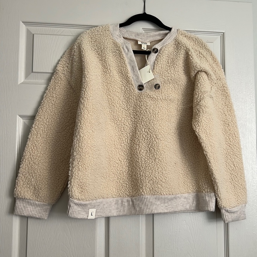 Sherpa tan sweater brand new never worn with tags and replacement button